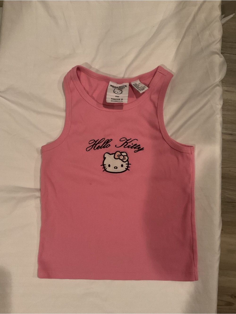 Forever 21 Kids Pink Hello Kitty Ribbed Tank Top has a small stain pictured